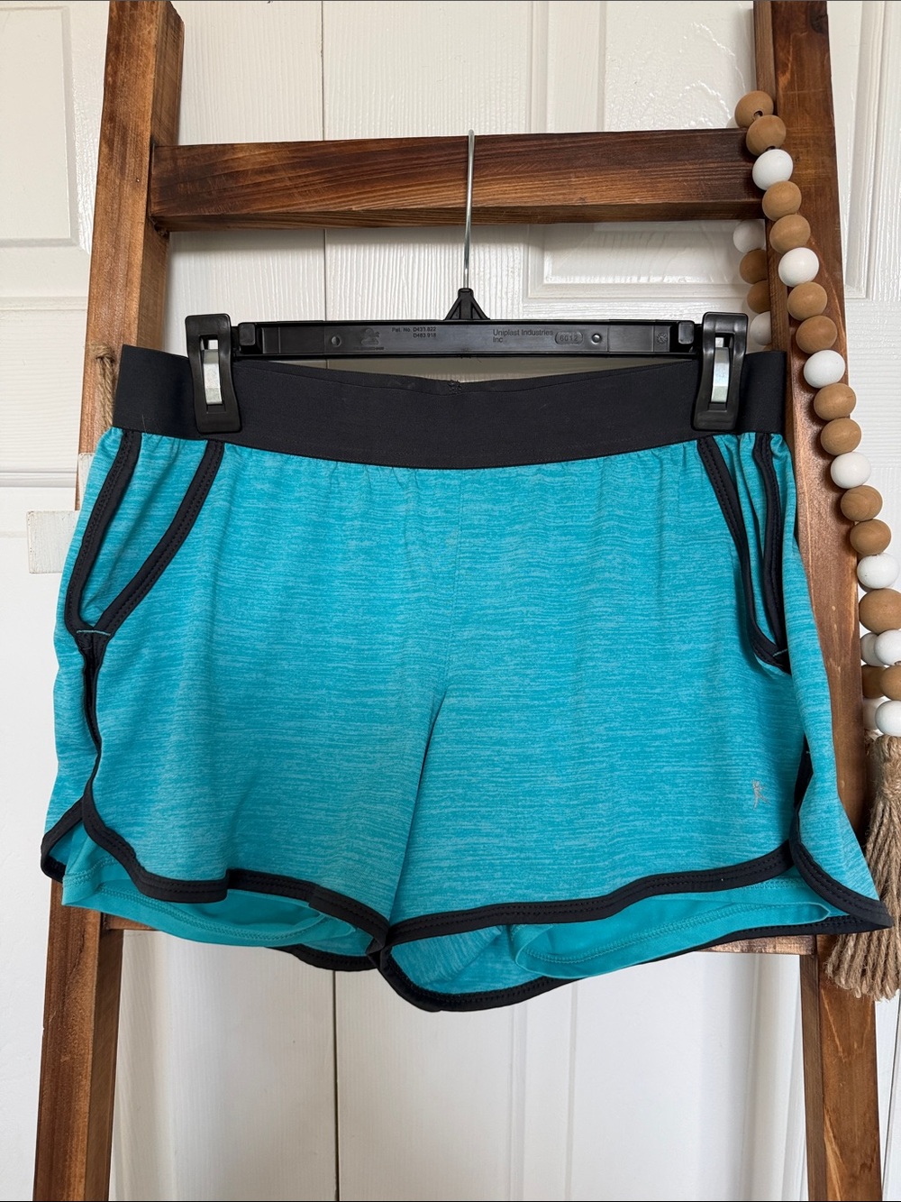 Danskin Teal Active Shorts with gray Trim, spandex shorts. Pockets